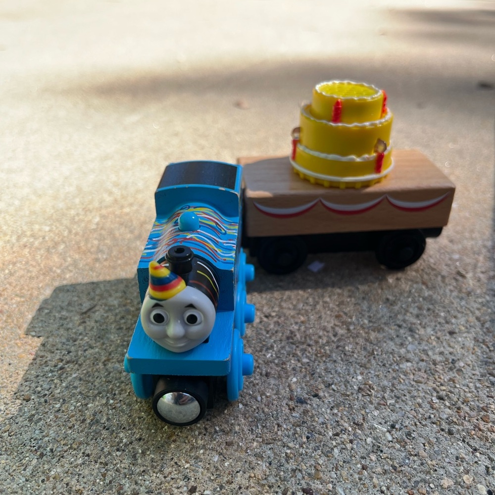 Birthday Thomas.. birthday cake plays the Thomas the train theme song.